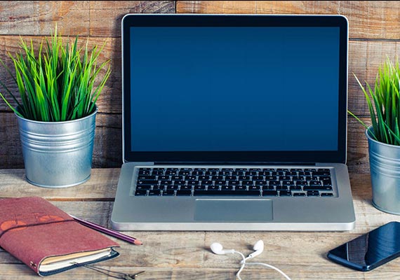 Man with neon Etiquette sign