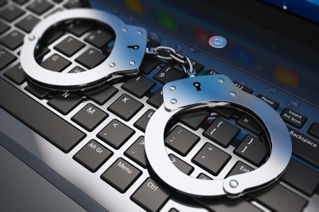 Handcuffs on keyboard